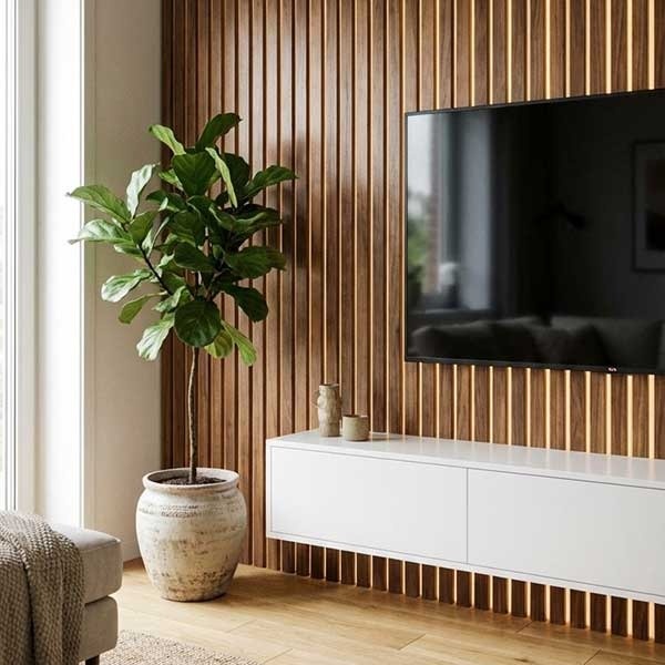 اجرای ترمووال چوبی و نورپردازی مخفی برای دیوار پشت تلویزیون